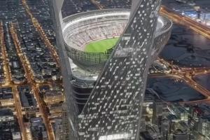 邮报曝：沙特AI生成摩天大楼球场视频，成本仅3元却骗过5000万人